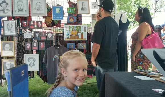 My niece and her missing tooth at a farmer's market